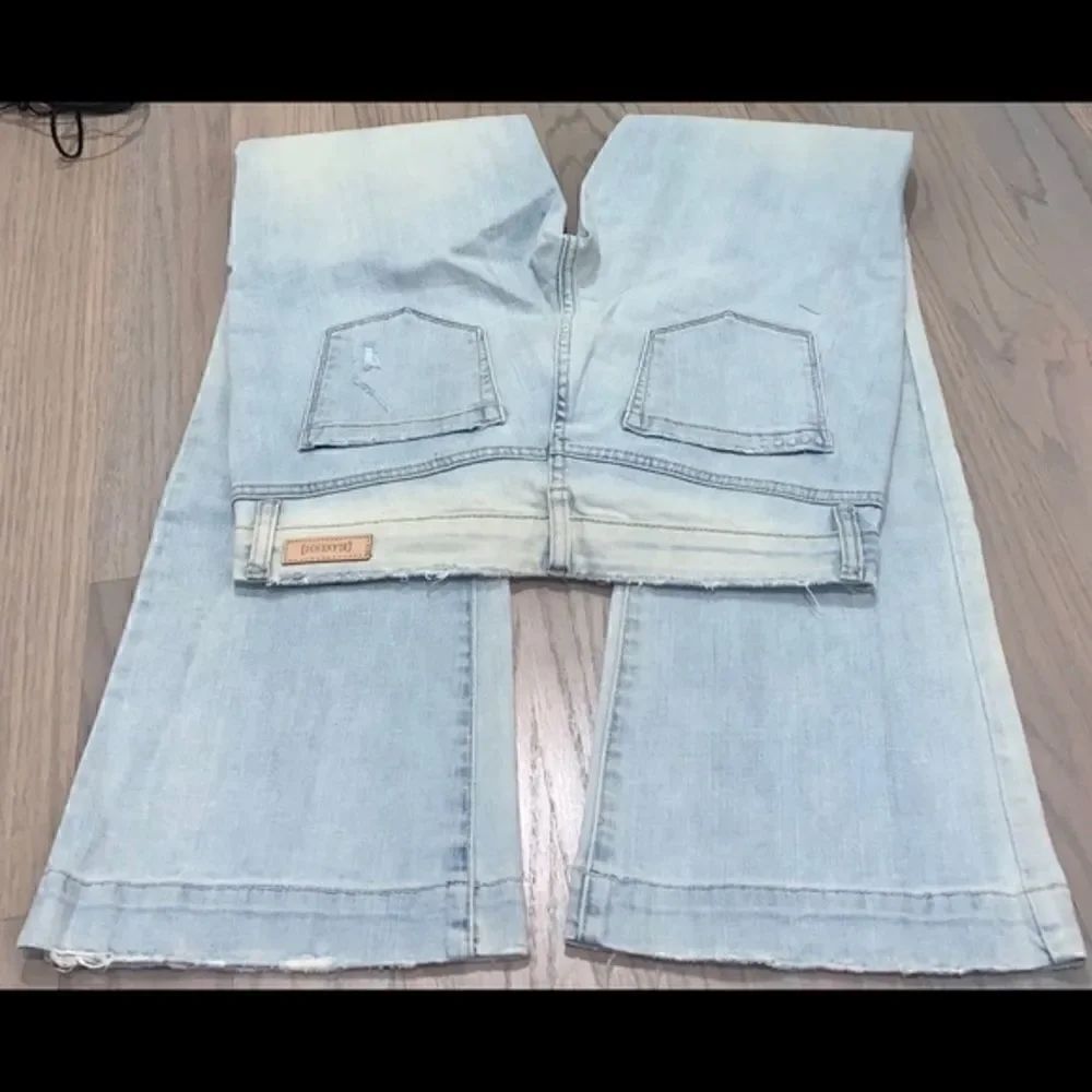 Blank NYC Flare distressed boot cut jeans